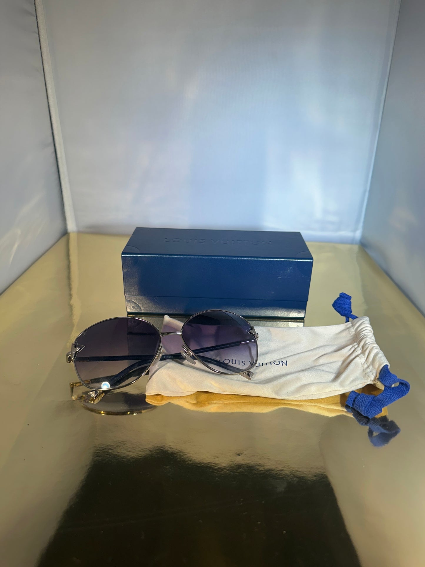 Lunettes de soleil Louis Vuitton bleues