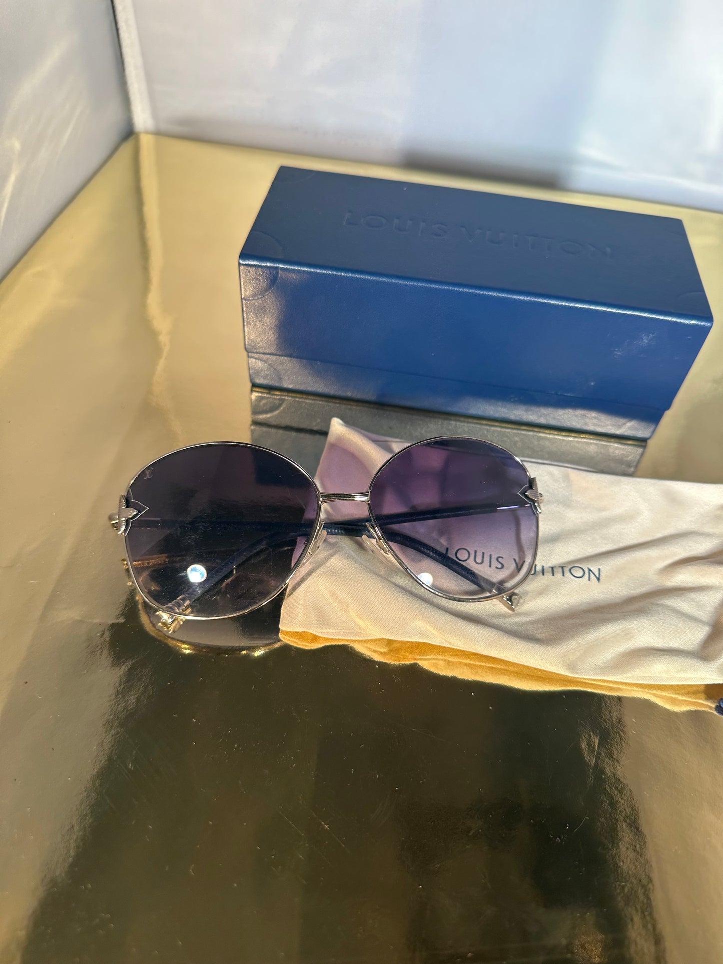 Lunettes de soleil Louis Vuitton bleues