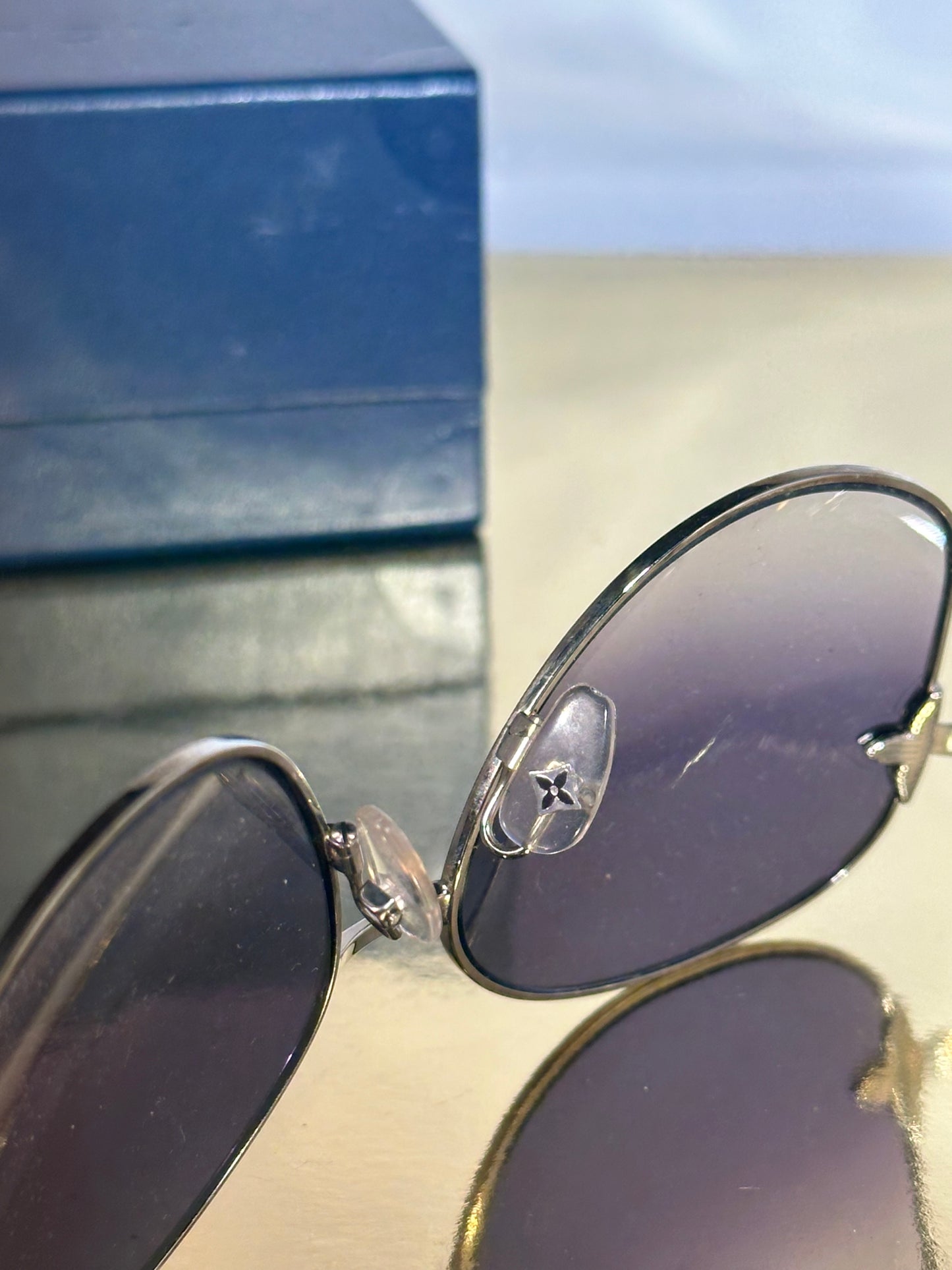 Lunettes de soleil Louis Vuitton bleues