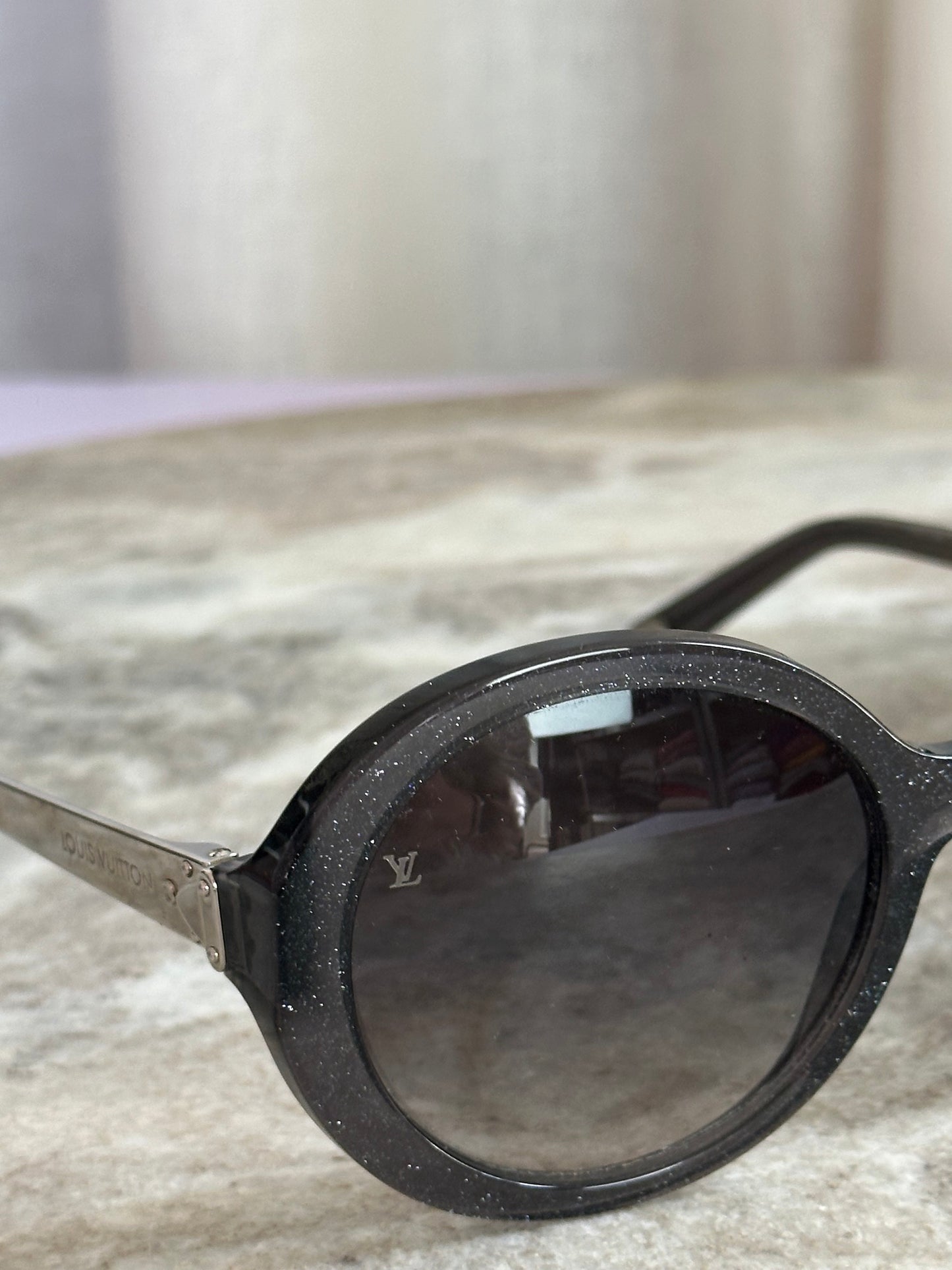 Zonnebril Louis Vuitton grijs/zilver