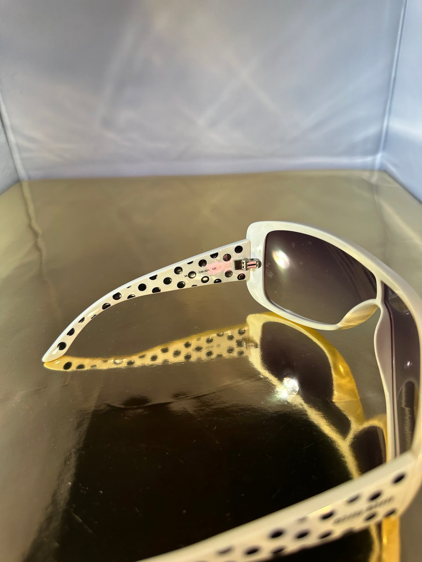 Zonnebril Miu Miu polkadot wit/zwart