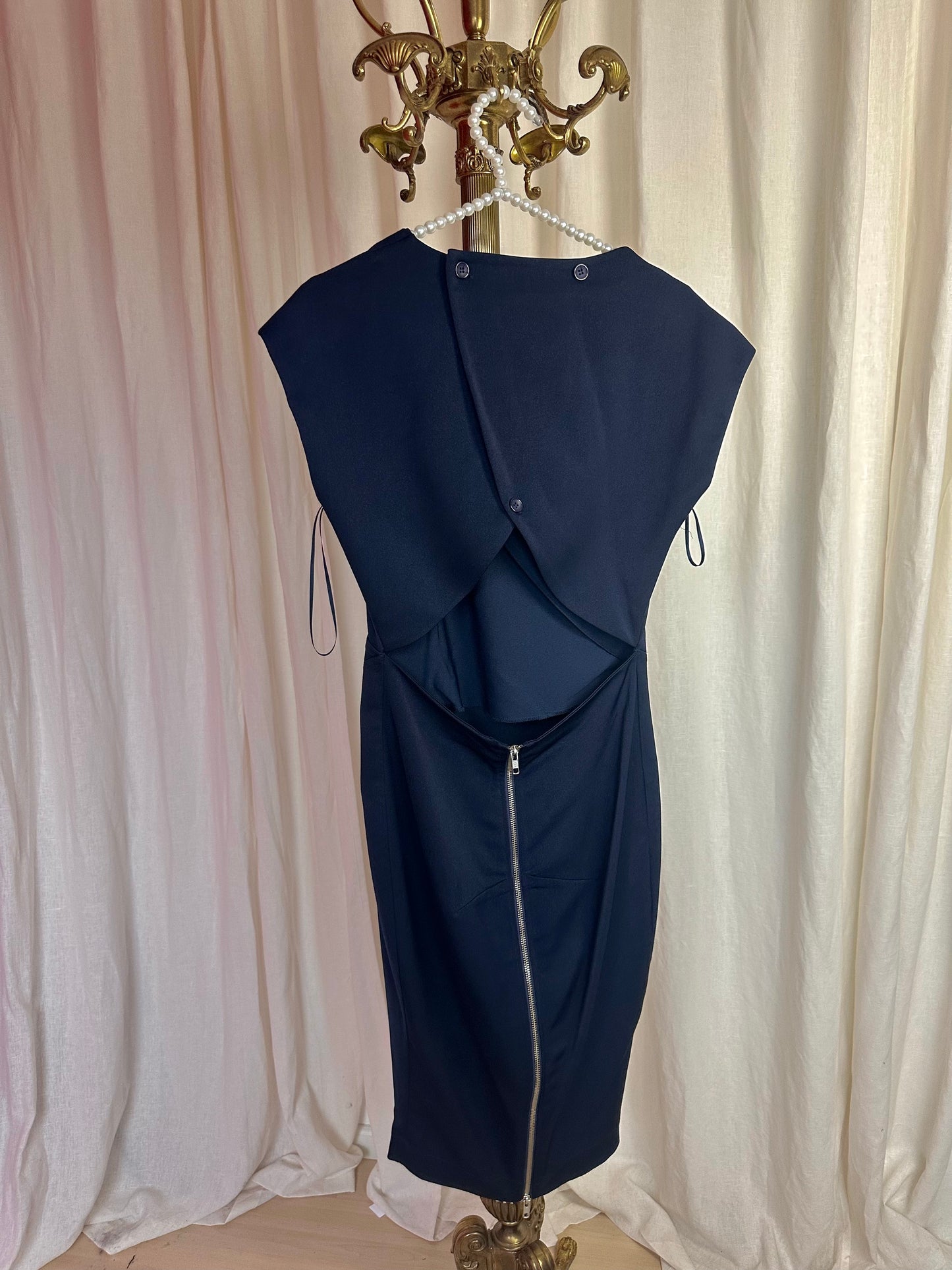 Jurk Nikkie open rug donkerblauw maat 36