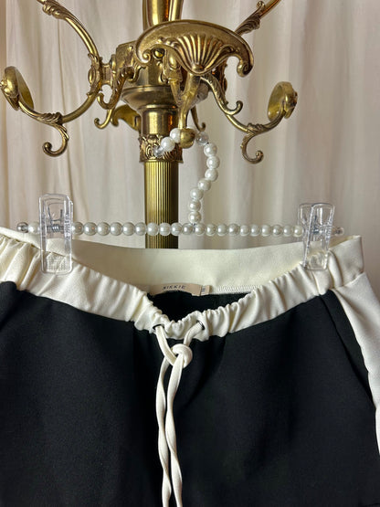 Set 2-delig Nikkie (jas + short) zwart, wit maat 38 (M)